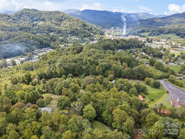 an aerial view of residential house and outdoor space
