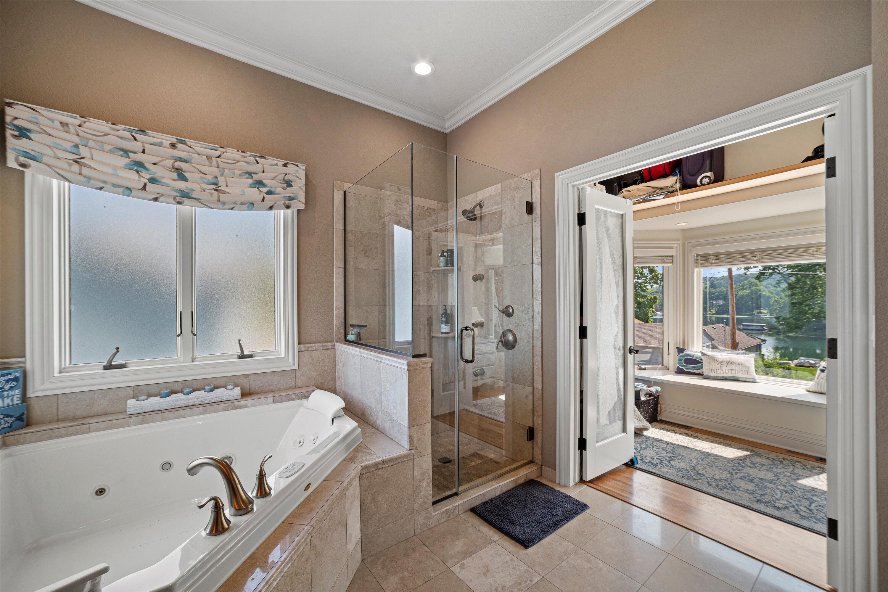 W332N6211 County Rd C Merton, WI 53058 - Photo 26 of 58 Primary bath with tile shower and walkin closet