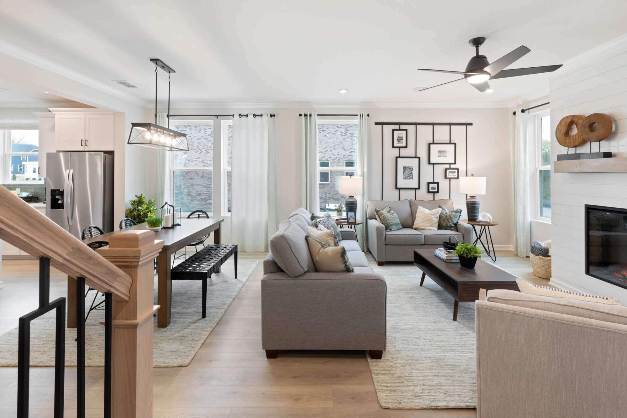 1300 Godwin Road Hermitage, TN 37076 - Photo 13 of 34 a living room with furniture a fireplace and a chandelier