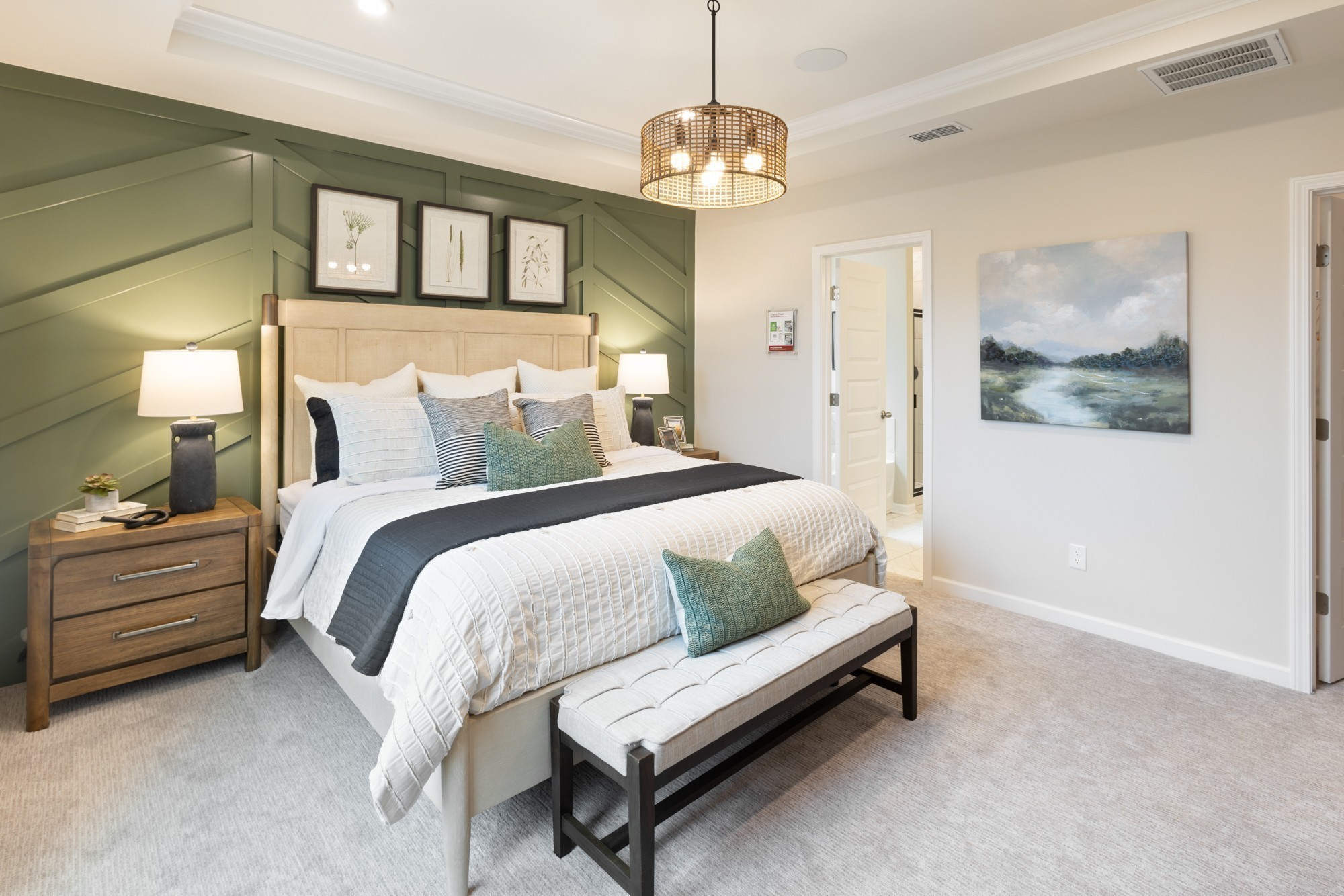 1300 Godwin Road Hermitage, TN 37076 - Photo 30 of 34 a spacious bedroom with a bed and a chandelier