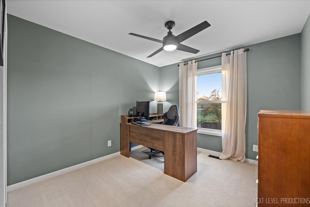 602 Highbury Lane Geneva, IL 60134 - Photo 16 of 28 a view of workspace with a ceiling fan