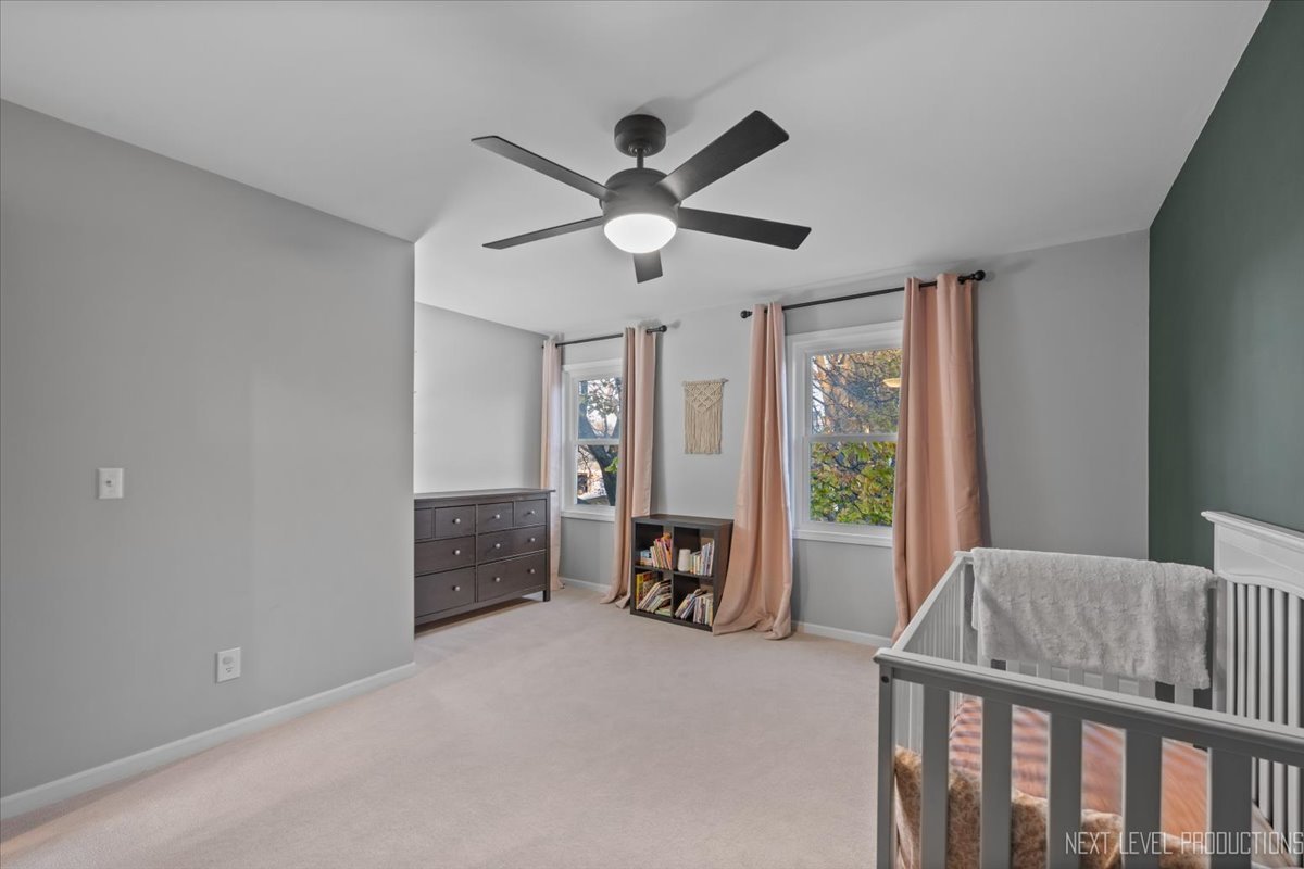 602 Highbury Lane Geneva, IL 60134 - Photo 17 of 28 a living room with furniture and a window