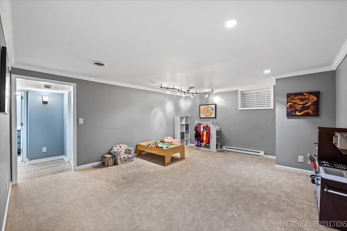 602 Highbury Lane Geneva, IL 60134 - Photo 22 of 28 a view of a room with gym equipment