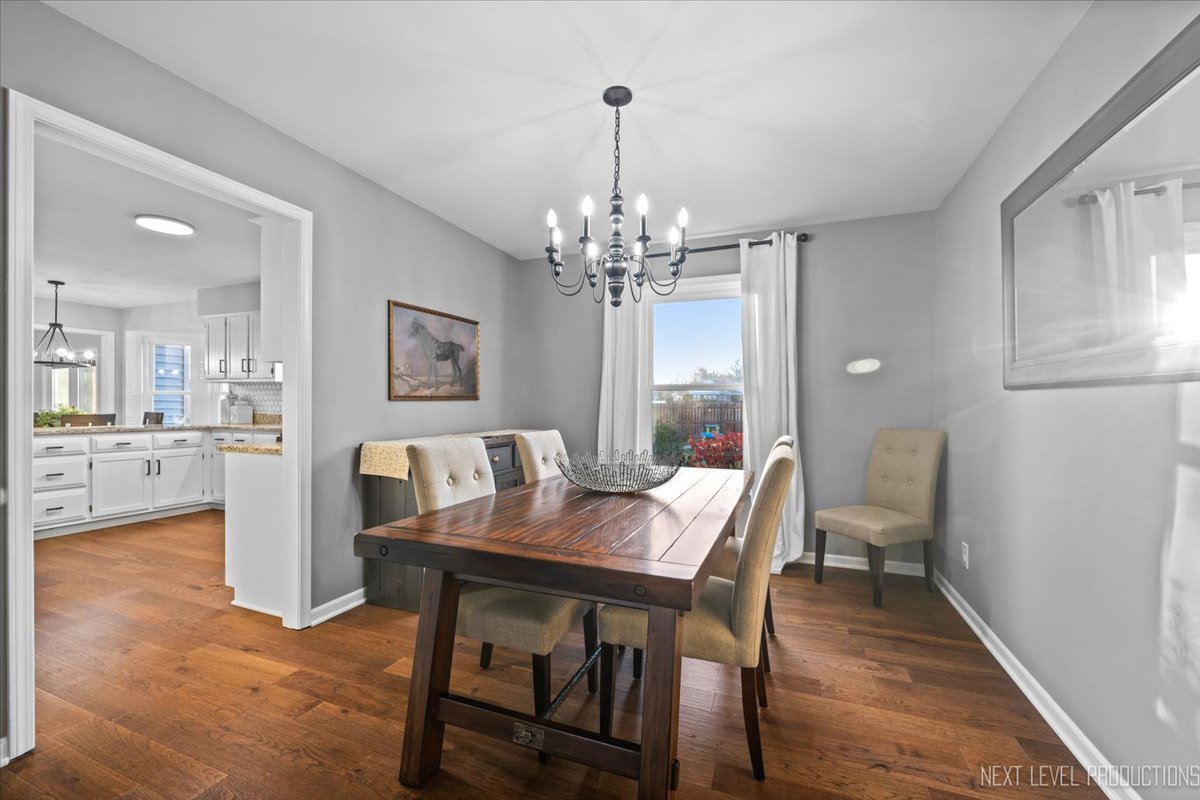 602 Highbury Lane Geneva, IL 60134 - Photo 7 of 28 a view of a dining room with furniture and window