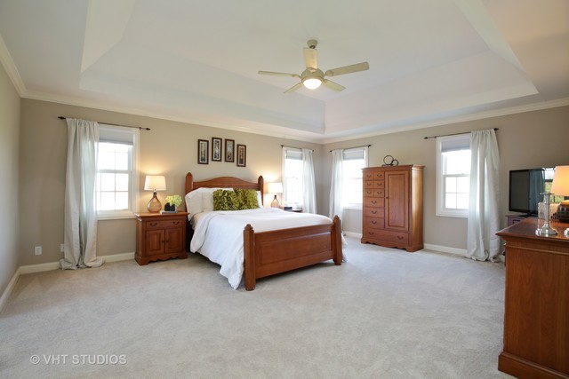 7-n346 7-n346 7n346 Ridge St. Charles, IL 60175 - Photo 13 of 31 a spacious bedroom with a bed and a chandelier