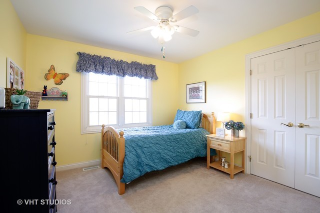 7-n346 7-n346 7n346 Ridge St. Charles, IL 60175 - Photo 16 of 31 a bedroom with a bed and a window