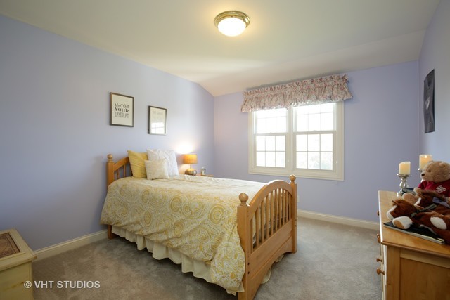 7-n346 7-n346 7n346 Ridge St. Charles, IL 60175 - Photo 17 of 31 a bedroom with a bed and a window