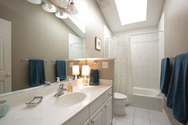 7-n346 7-n346 7n346 Ridge St. Charles, IL 60175 - Photo 20 of 31 a bathroom with a granite countertop sink toilet and shower
