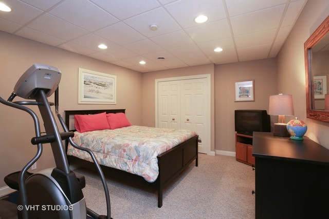 7-n346 7-n346 7n346 Ridge St. Charles, IL 60175 - Photo 23 of 31 a bedroom with a bed and a flat screen tv