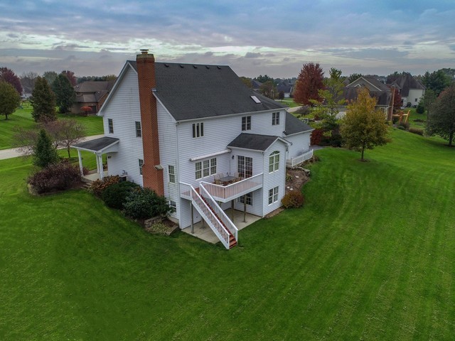 7-n346 7-n346 7n346 Ridge St. Charles, IL 60175 - Photo 27 of 31 a view of a house with a yard