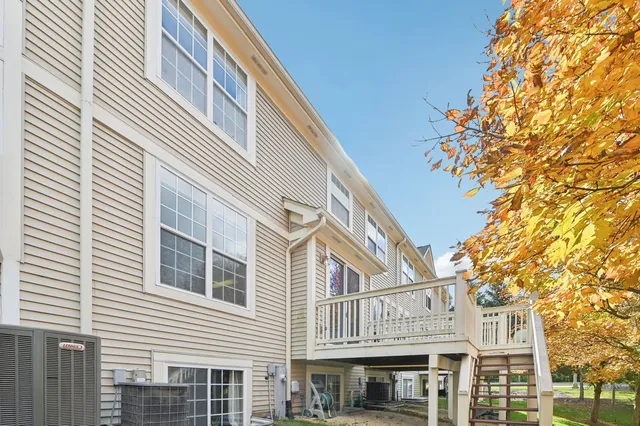 a view of a building with a tree