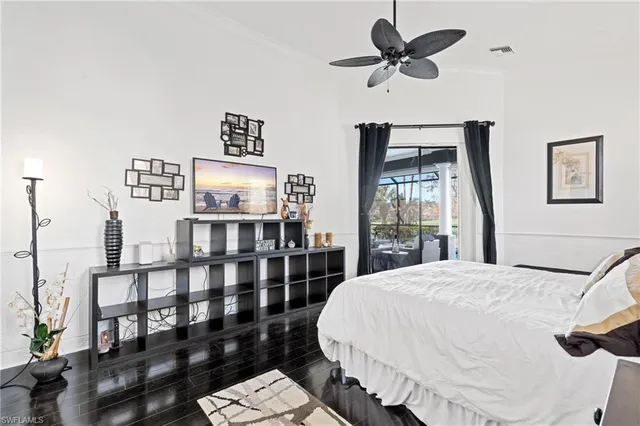 a bedroom with furniture and window