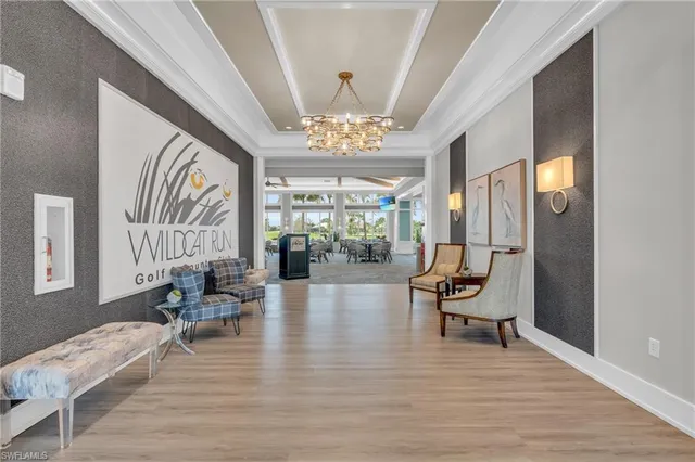 a view of a living room and dining room