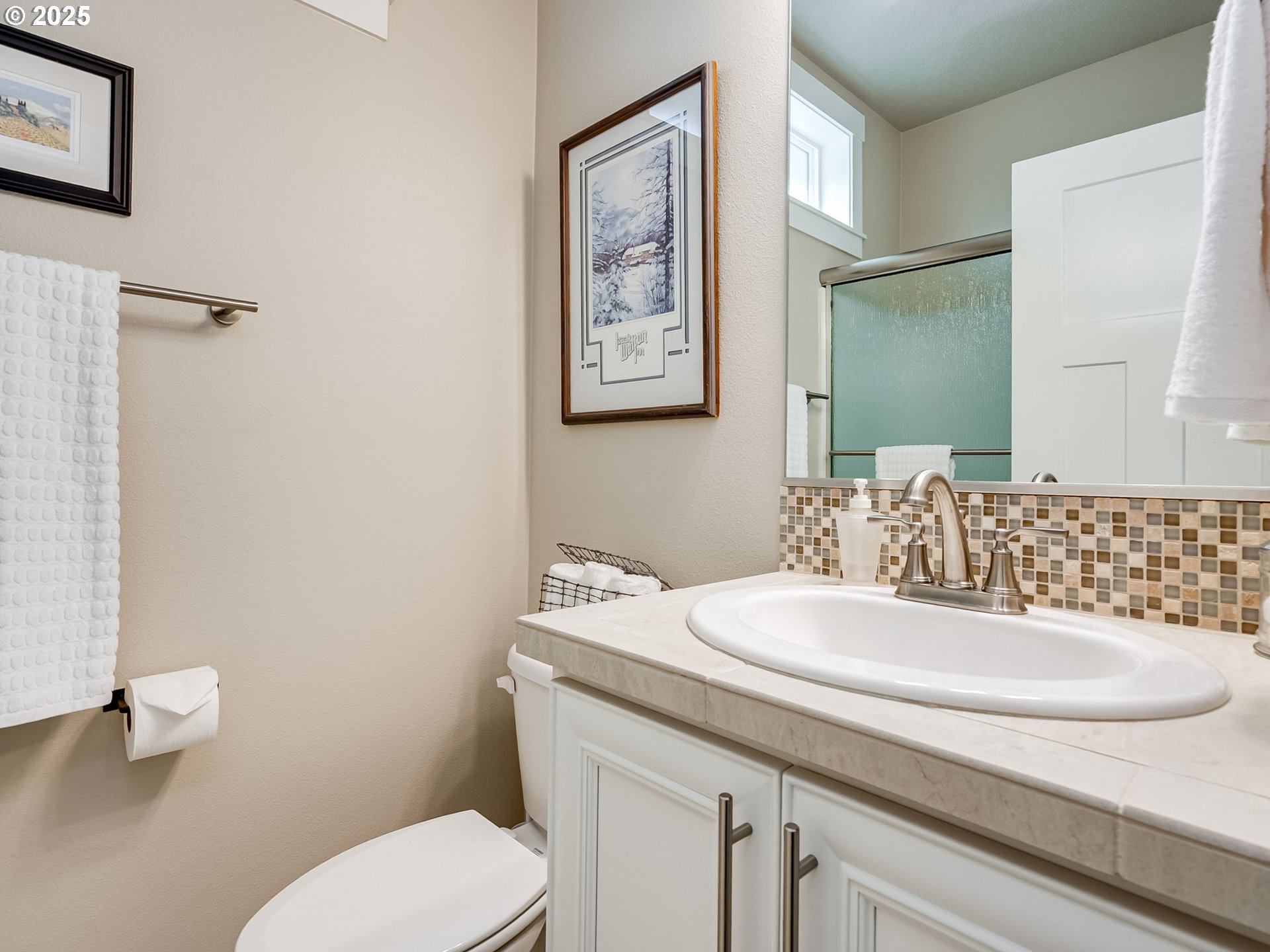 1724 South Harrier Road Ridgefield, WA 98642 - Photo 31 of 47 a bathroom with a sink and a toilet
