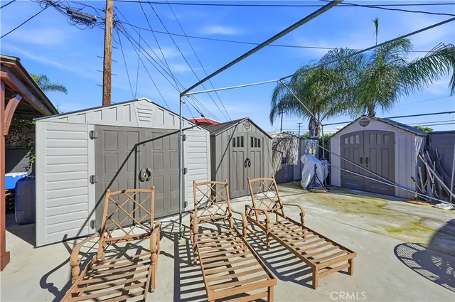 a view of a house with swimming pool yard and sitting area