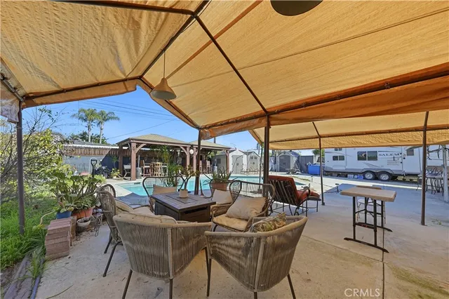swimming pool view with seating space