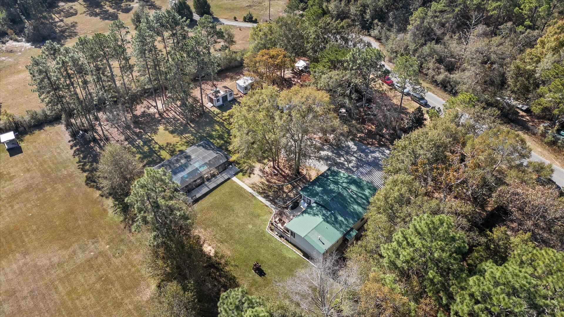 6604 Possum Ridge Road Crestview, FL 32539 - Photo 54 of 55 a view of a house with a yard