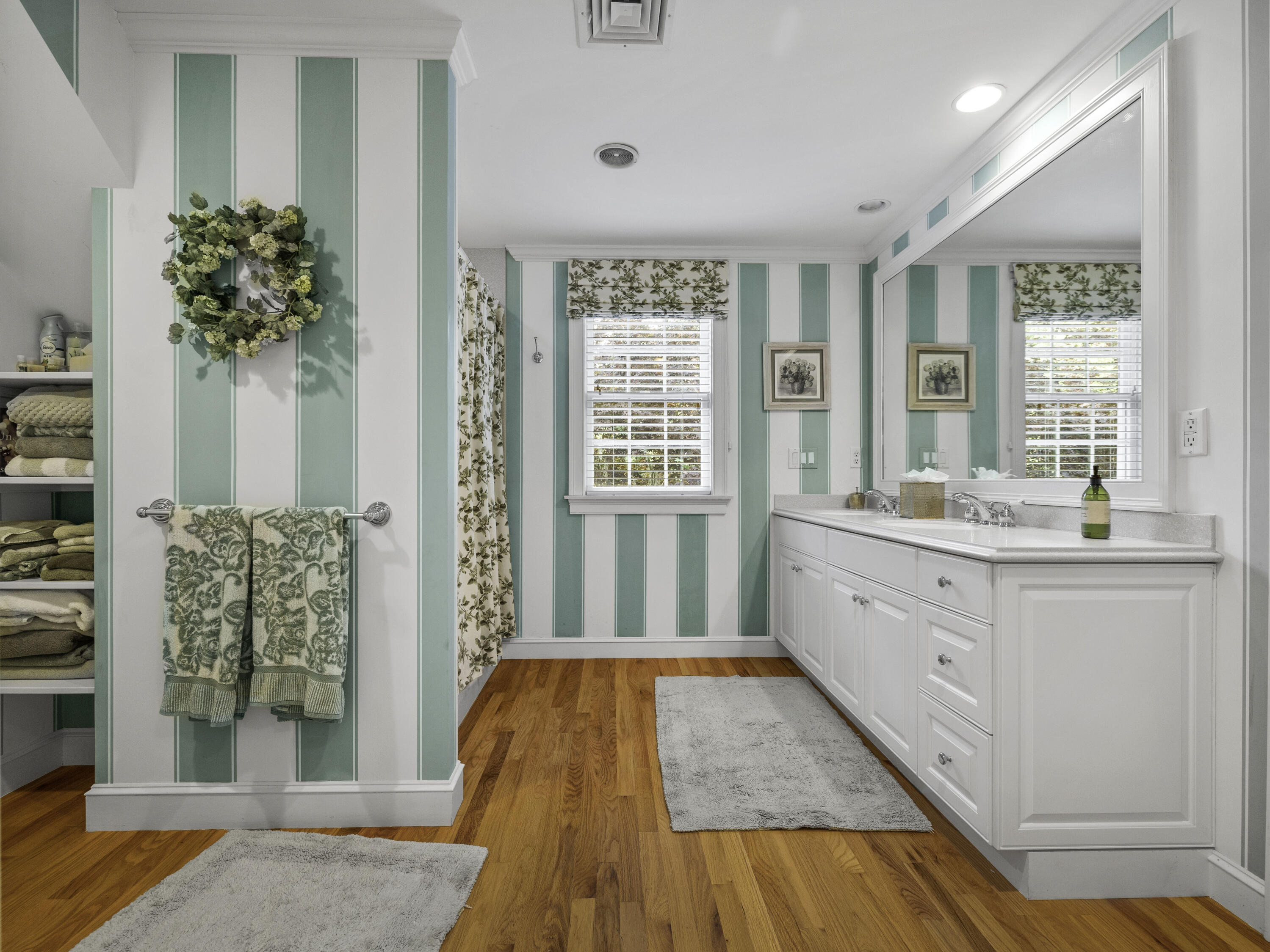 405 Baxter Neck Road Marstons Mills, MA 02648 - Photo 18 of 36 a spacious bathroom with a double vanity sink and a window