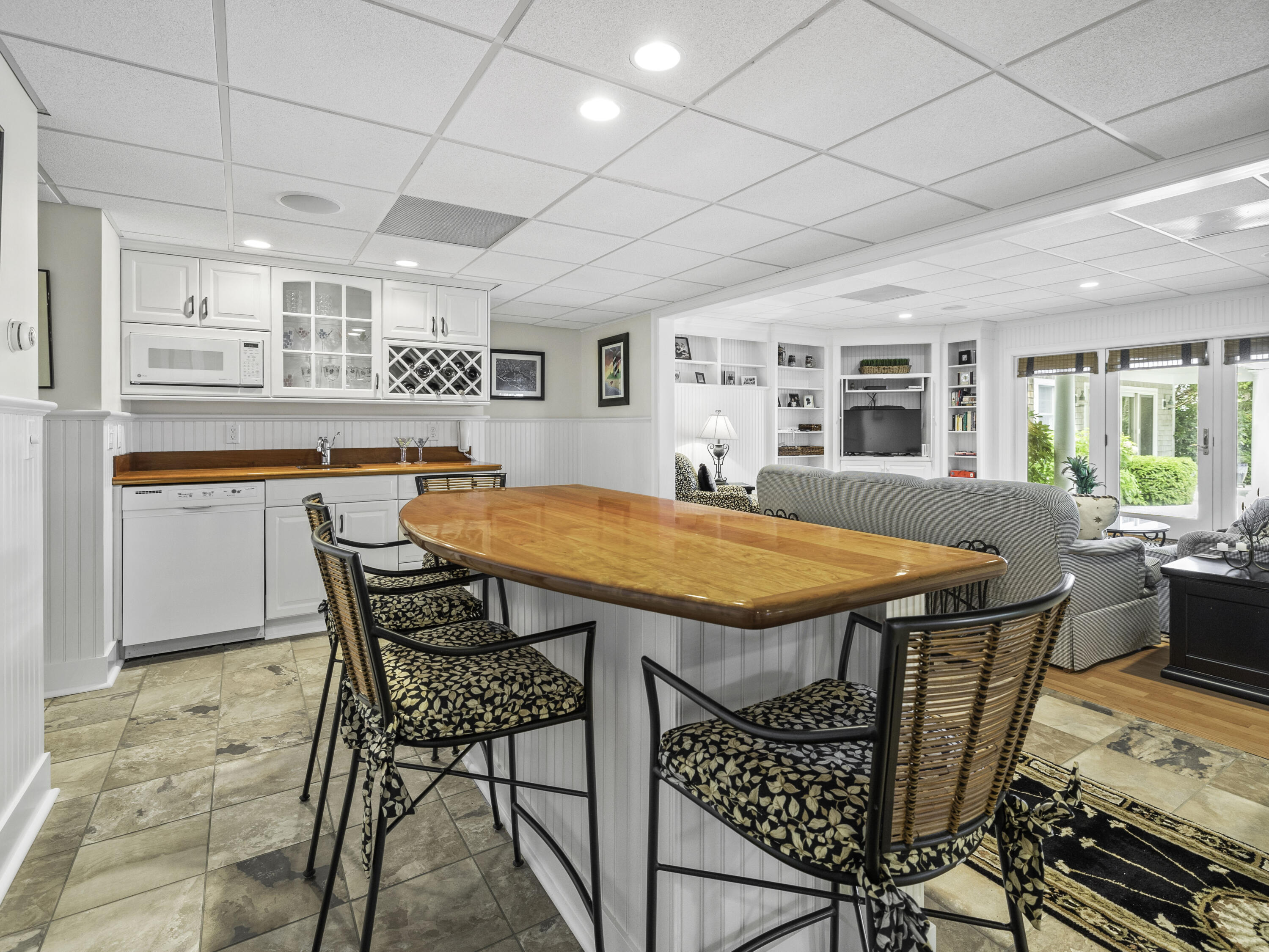 405 Baxter Neck Road Marstons Mills, MA 02648 - Photo 21 of 36 a patio with table and chairs