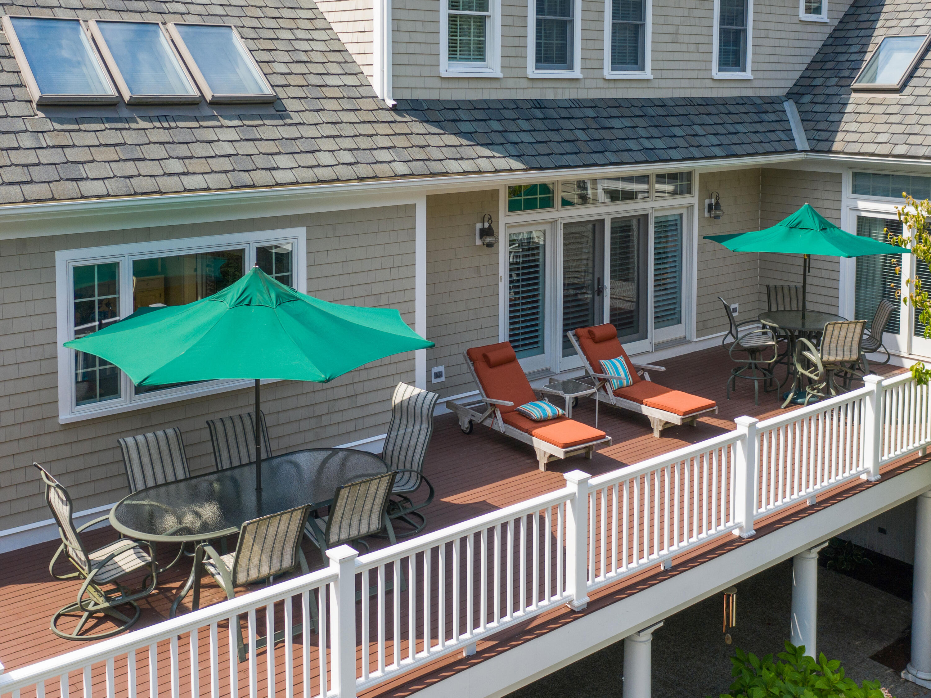 405 Baxter Neck Road Marstons Mills, MA 02648 - Photo 27 of 36 a backyard of a house with barbeque oven table and chairs