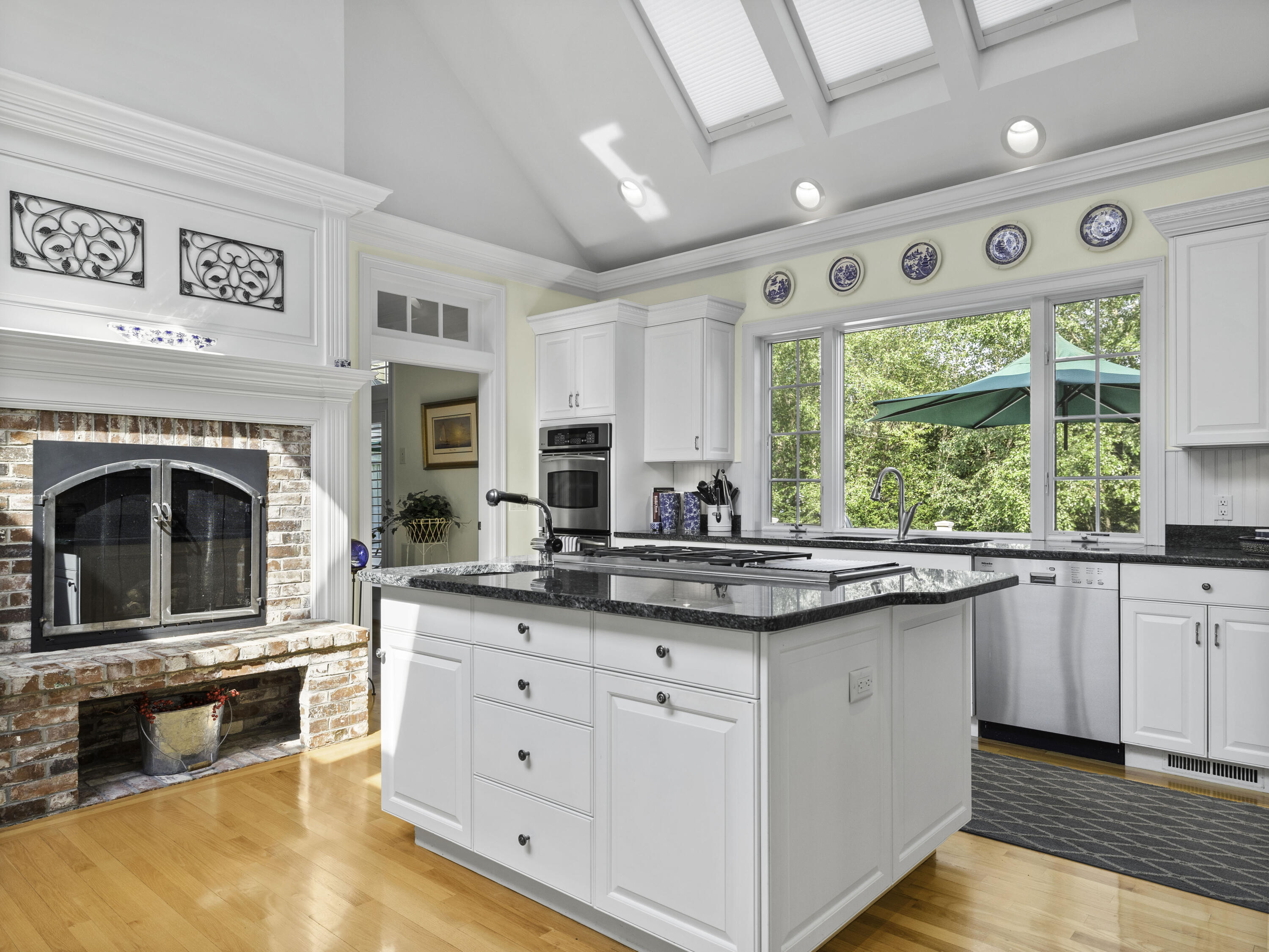 405 Baxter Neck Road Marstons Mills, MA 02648 - Photo 8 of 36 a kitchen with stainless steel appliances granite countertop a stove and a sink