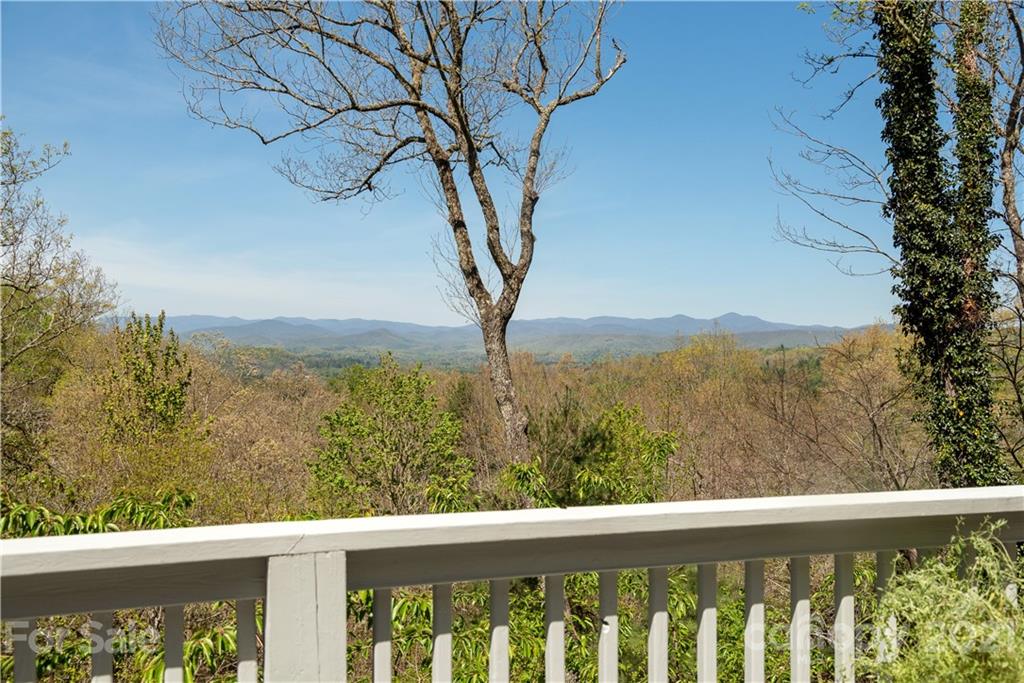 5561 Spring Road Hendersonville, NC 28739 - Photo 16 of 30 a view of a balcony with an ocean view