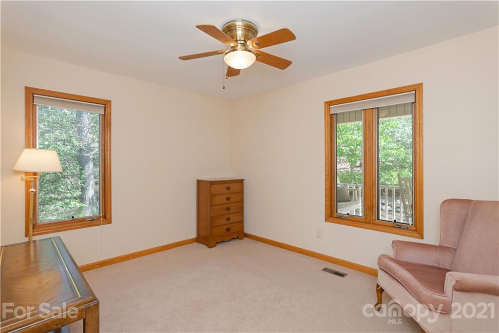 5561 Spring Road Hendersonville, NC 28739 - Photo 23 of 30 a living room with furniture and a window