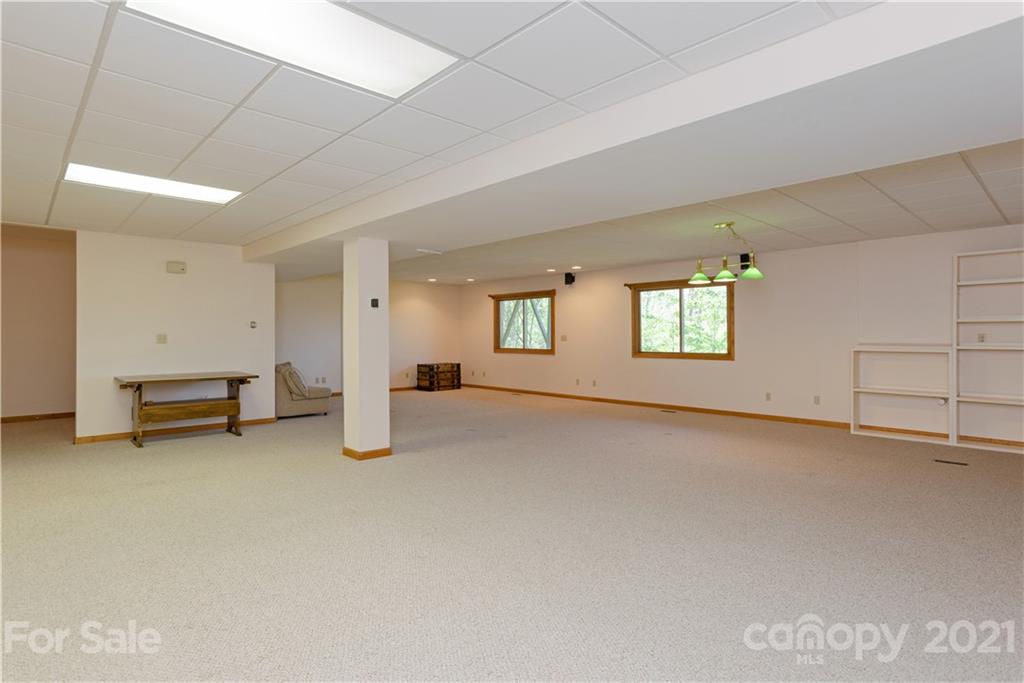 5561 Spring Road Hendersonville, NC 28739 - Photo 24 of 30 a view of an empty room with windows