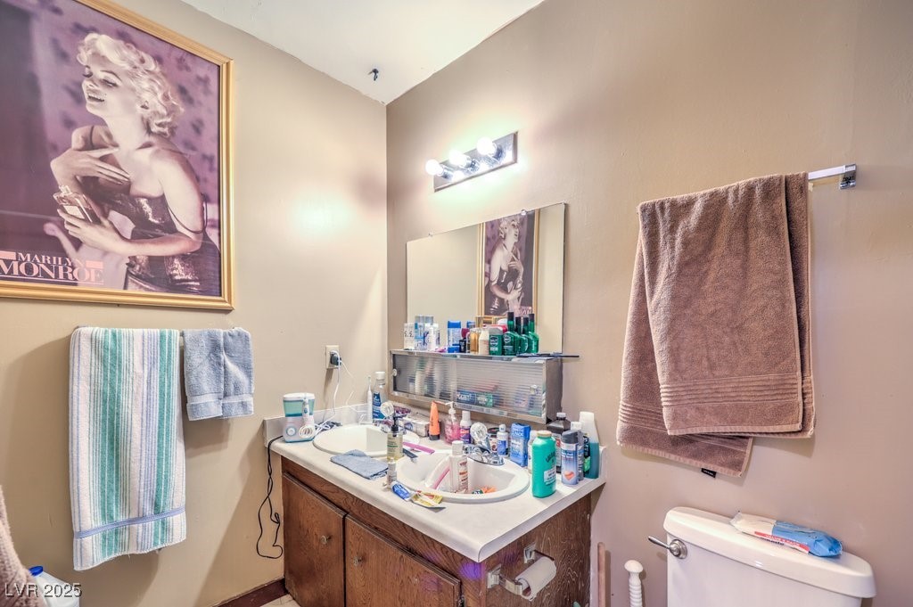 4216 North Decatur Boulevard North Las Vegas, NV 89032 - Photo 11 of 36 Bathroom with toilet and vanity