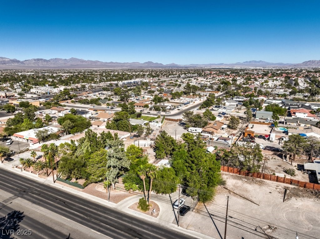 4216 North Decatur Boulevard North Las Vegas, NV 89032 - Photo 30 of 36 Aerial perspective of suburban area with a mountain backdrop