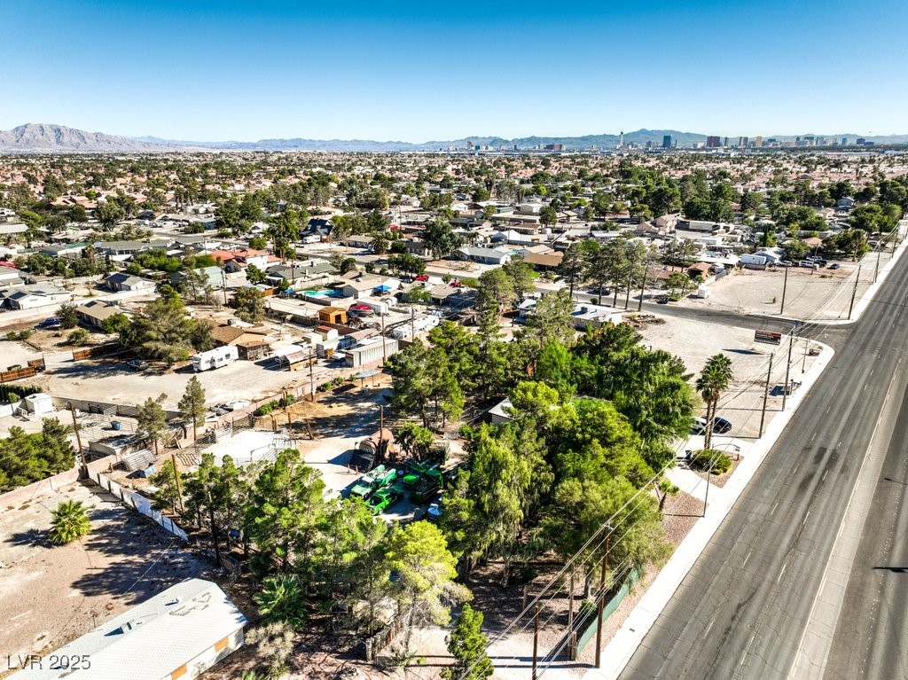 4216 North Decatur Boulevard North Las Vegas, NV 89032 - Photo 31 of 36 Aerial perspective of suburban area featuring mountains