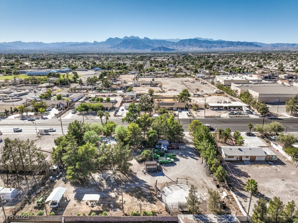 4216 North Decatur Boulevard North Las Vegas, NV 89032 - Photo 34 of 36 Aerial perspective of suburban area with a mountainous background