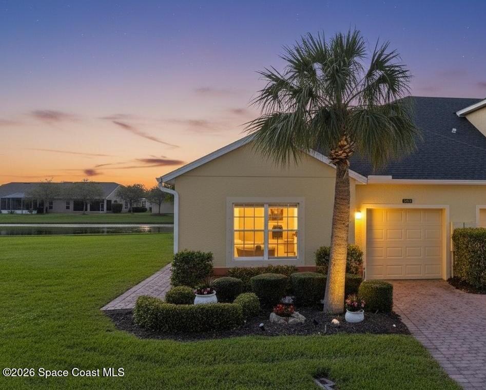 a house view with a garden space