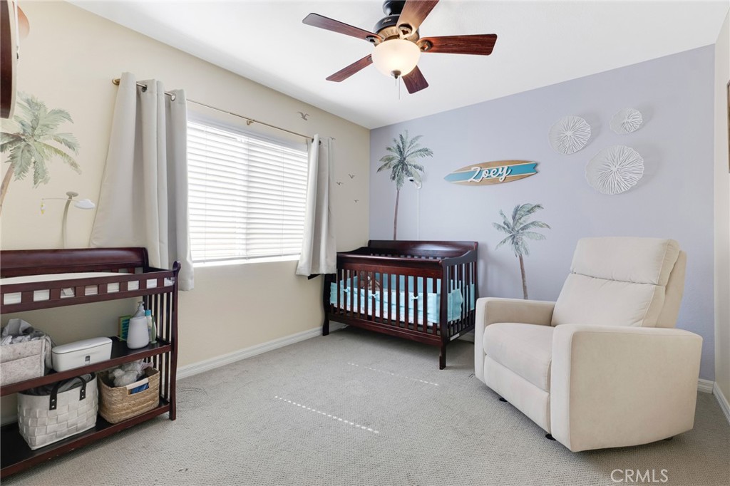 3843 San Gabriel Street Simi Valley, CA 93063 - Photo 37 of 52 a bedroom with a bed and a couch