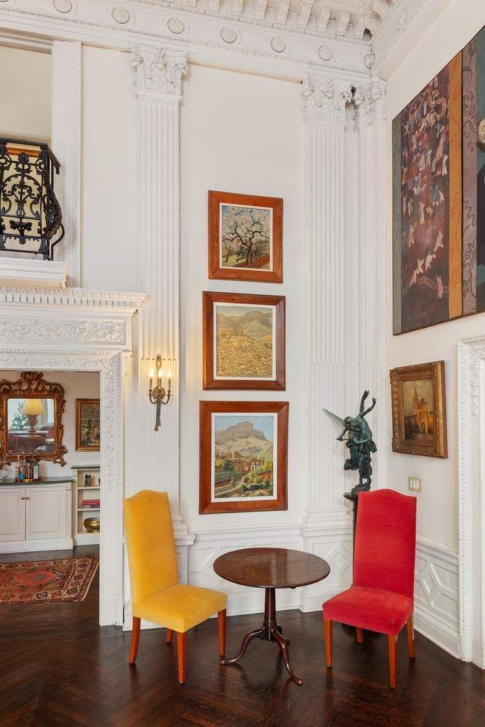 11 East 73rd Street, Unit 1D Manhattan, NY 10021 - Photo 5 of 18 a living room with furniture and a painting on the wall