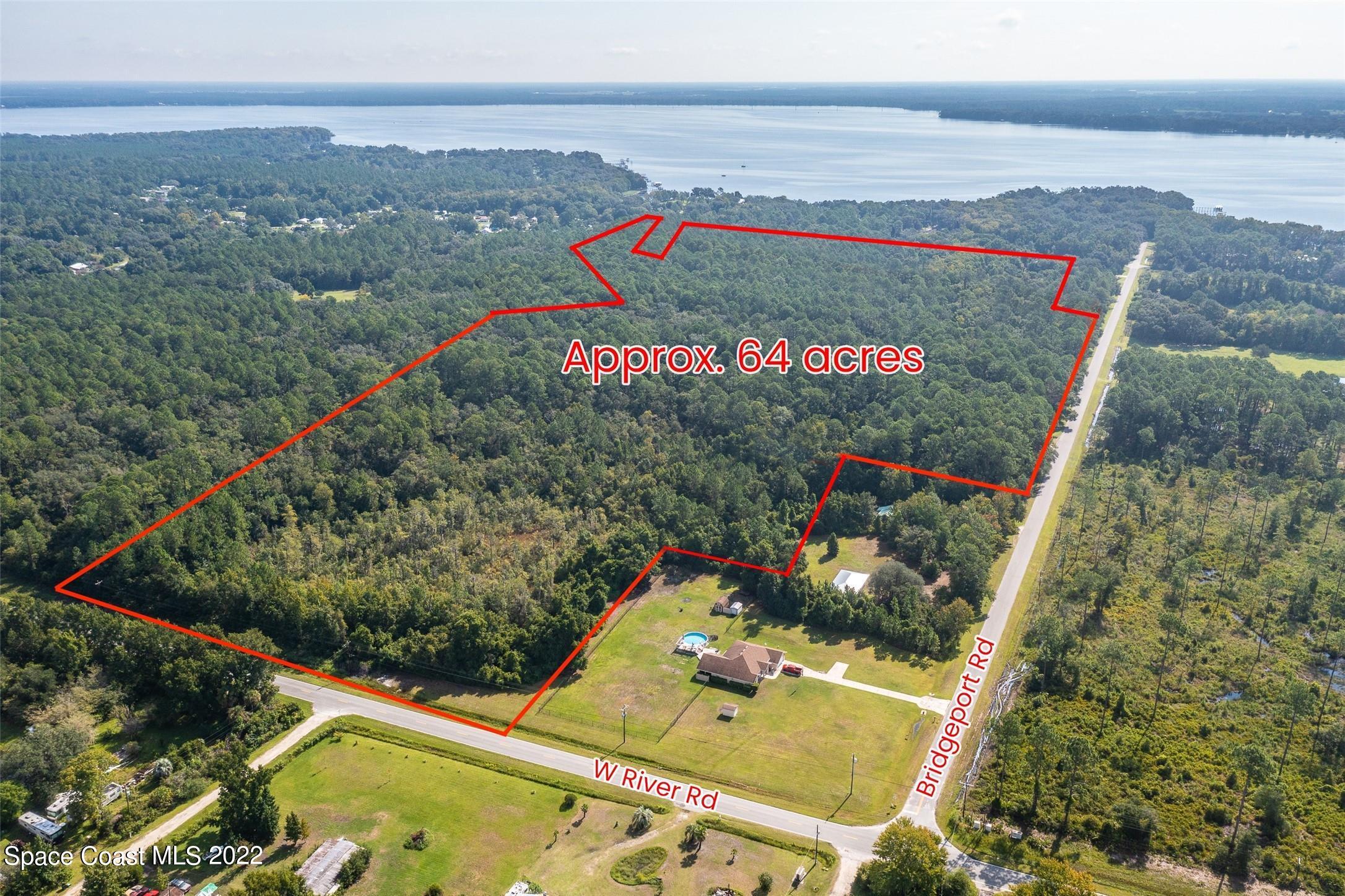 745 West River Road Palatka, FL 32177 - Photo 2 of 10 an aerial view of a tennis court