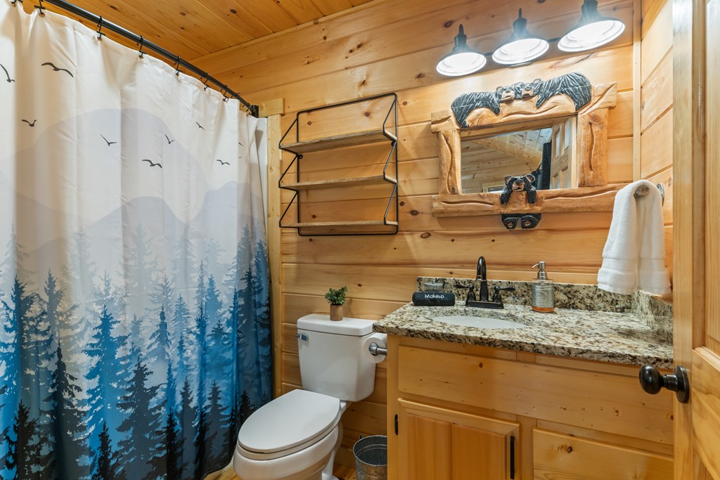 237 Bentley Cove Murphy, NC 28906 - Photo 20 of 43 a bathroom with a granite countertop sink toilet and shower
