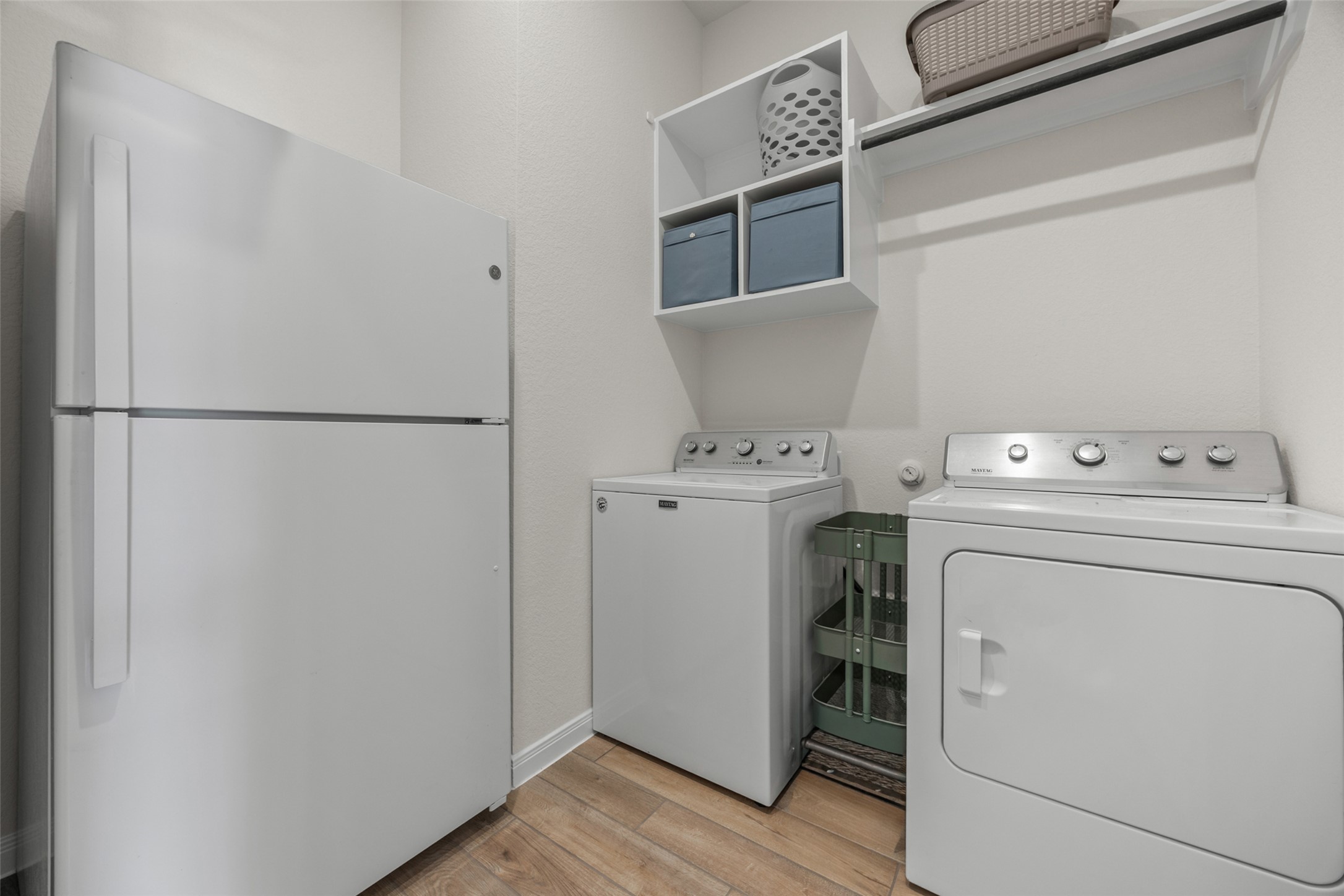 1200 Scenic Grn Loop Georgetown, TX 78628 - Photo 24 of 40 Laundry with storage and freezer/fridge space