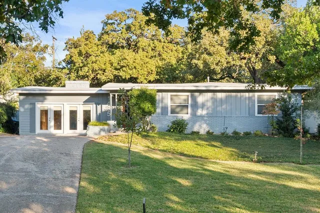 a view of a house with a swimming pool