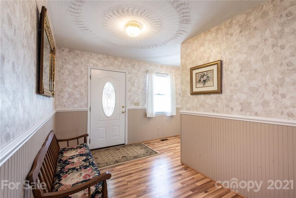 307 Kirkpatrick Road Taylorsville, NC 28681 - Photo 11 of 39 a room with furniture and wooden floor