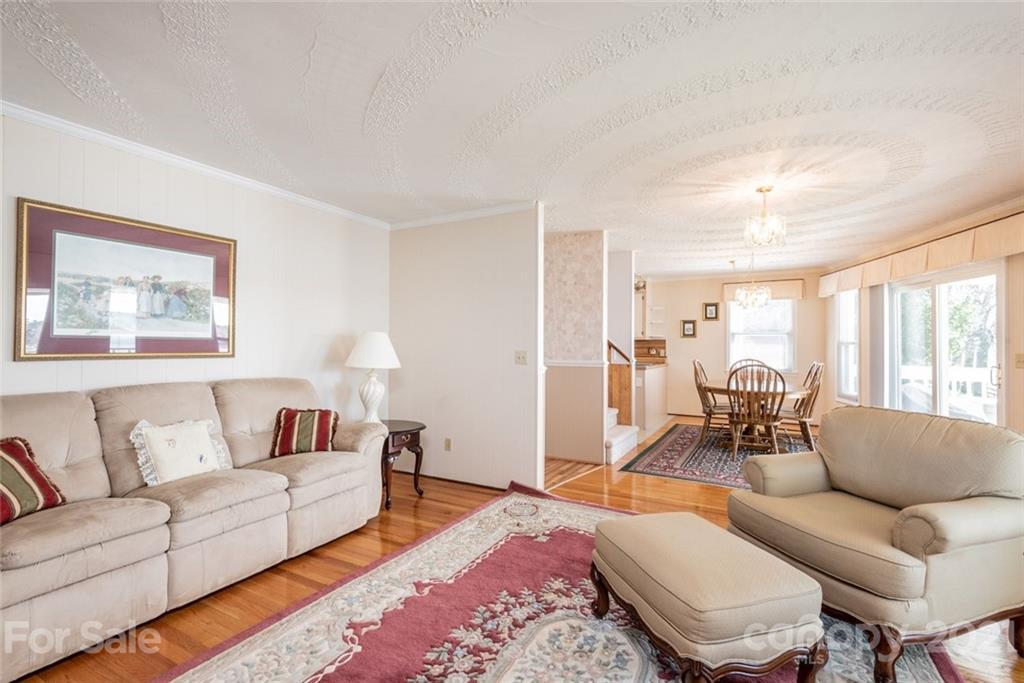 307 Kirkpatrick Road Taylorsville, NC 28681 - Photo 15 of 39 a living room with furniture and a couch