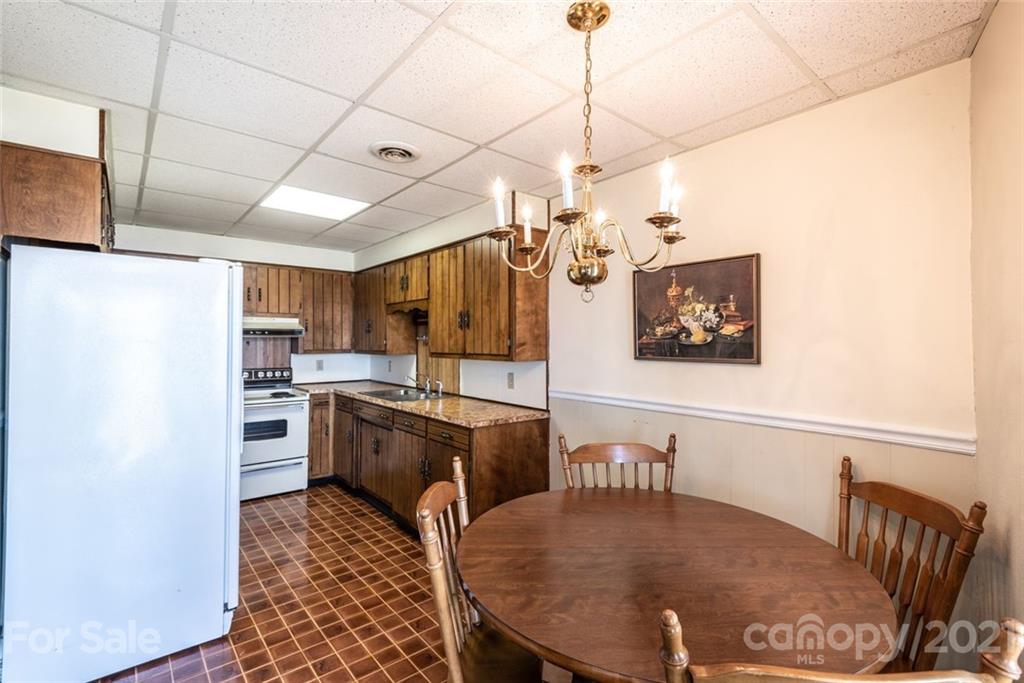 307 Kirkpatrick Road Taylorsville, NC 28681 - Photo 25 of 39 a view of a dining room with furniture