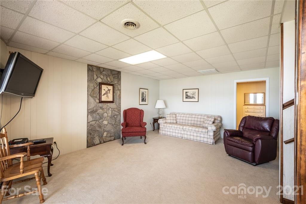 307 Kirkpatrick Road Taylorsville, NC 28681 - Photo 27 of 39 a bedroom with furniture and a window