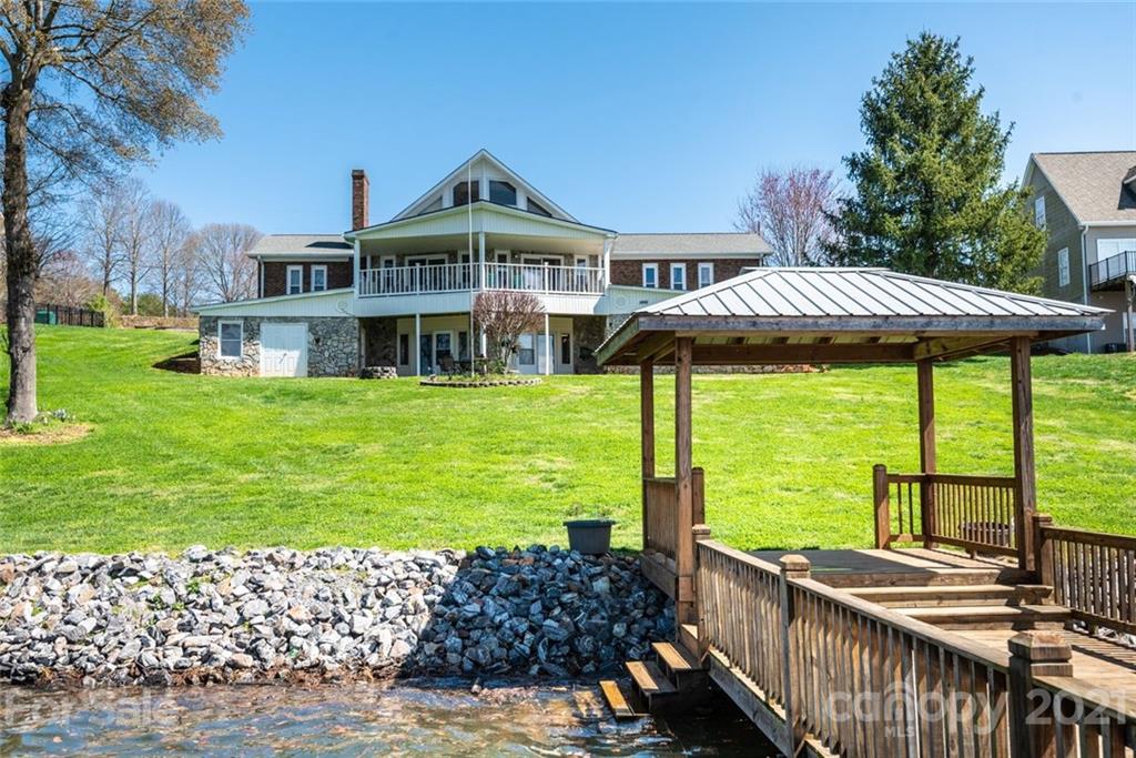 307 Kirkpatrick Road Taylorsville, NC 28681 - Photo 7 of 39 a front view of a house with garden