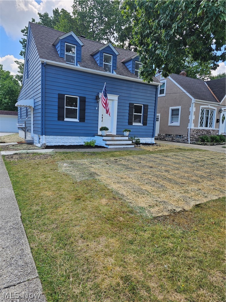 1147 Mayfield Ridge Road Cleveland, OH 44124 - Photo 2 of 23 Cape cod-style house with a front yard