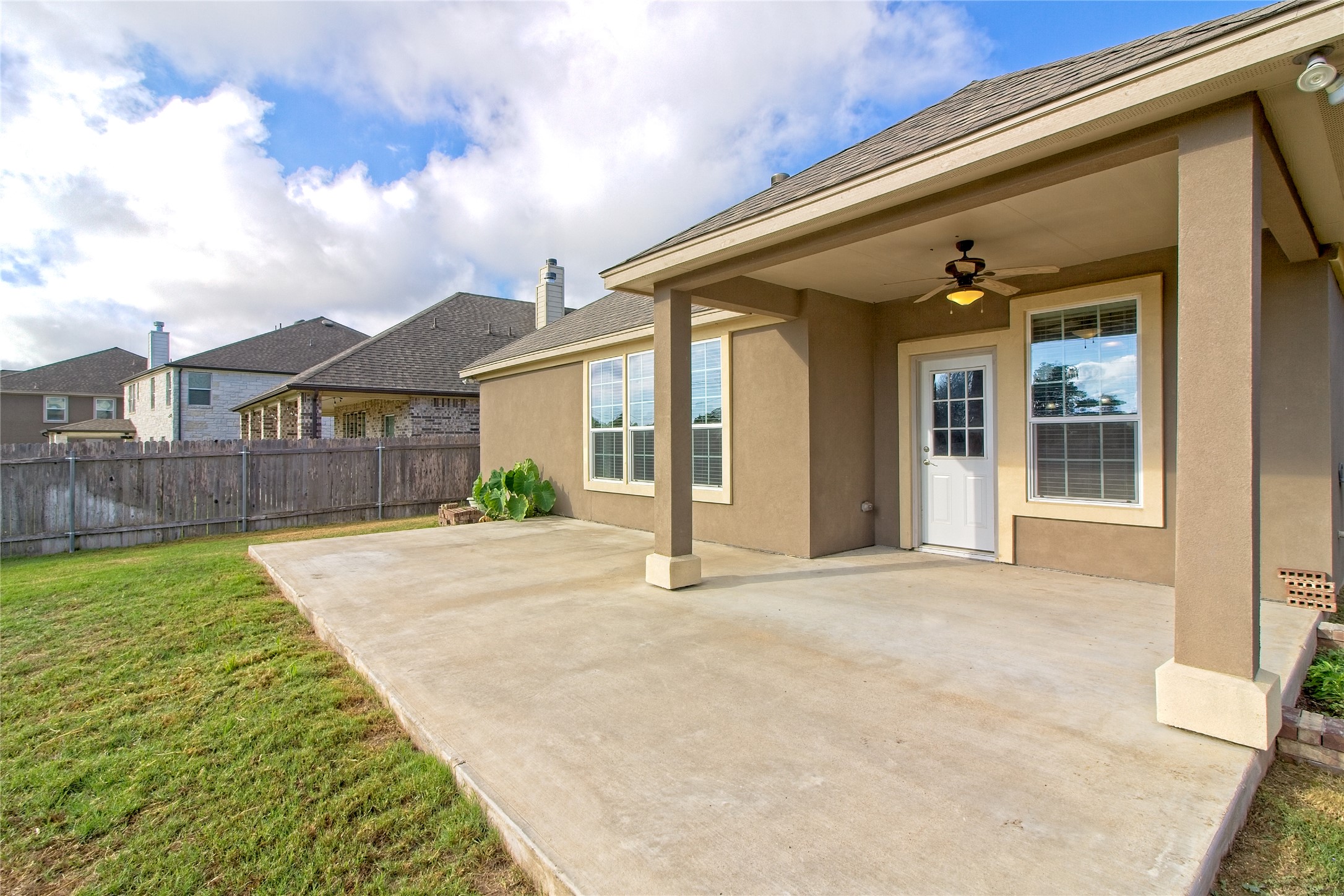 31443 Kingsway Road Georgetown, TX 78628 - Photo 25 of 40 A spacious covered patio extends gracefully from the home, perfect for outdoor leisure.