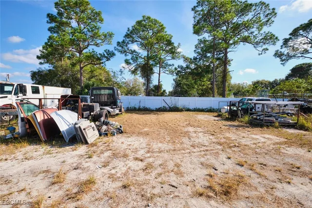 an aerial view of ocean with residential house and lake view