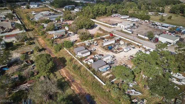 a roof deck with table and chairs