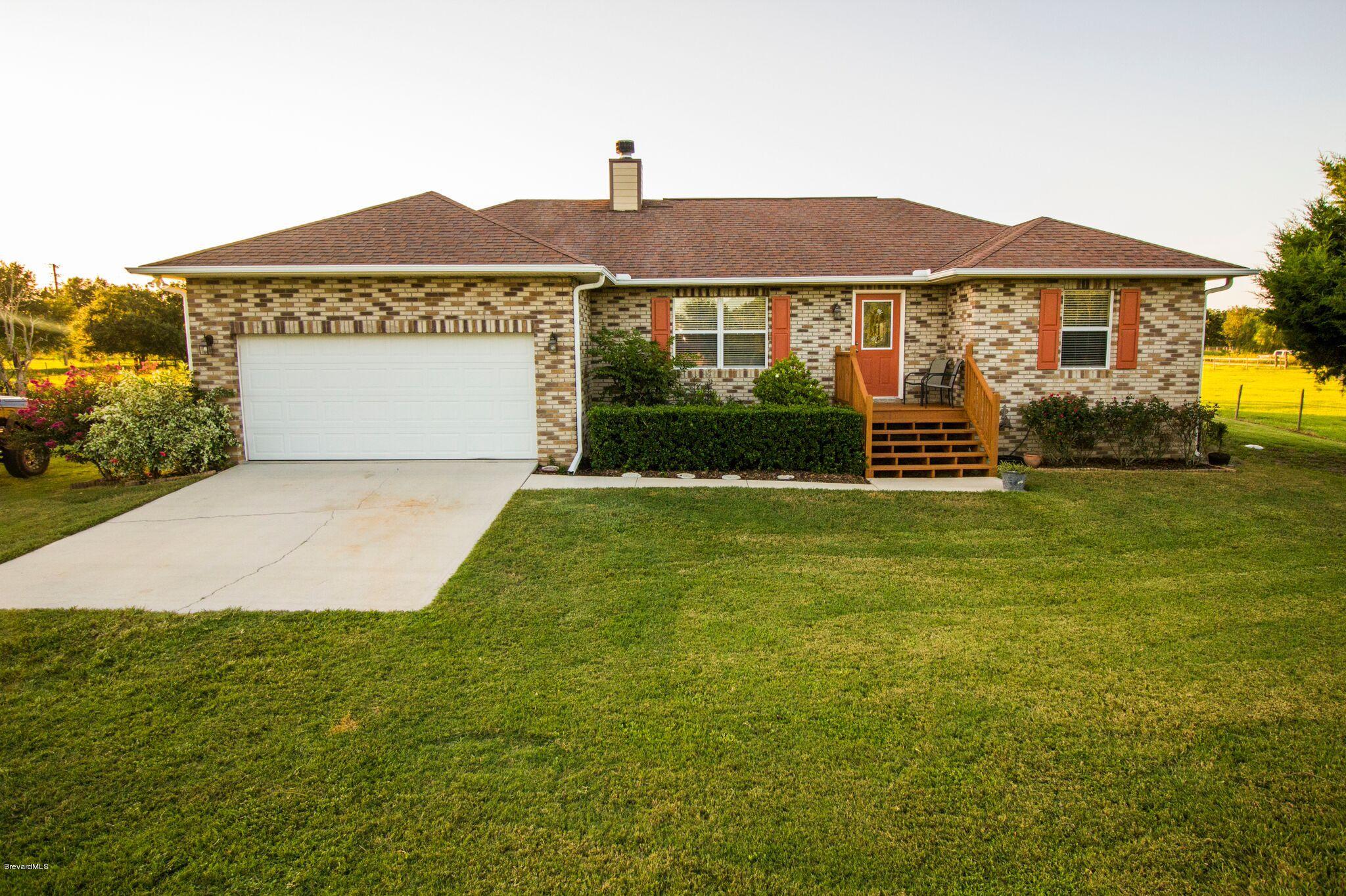 3300 Grandperrin Road Mims, FL 32754 - Photo 1 of 23 3300 house front