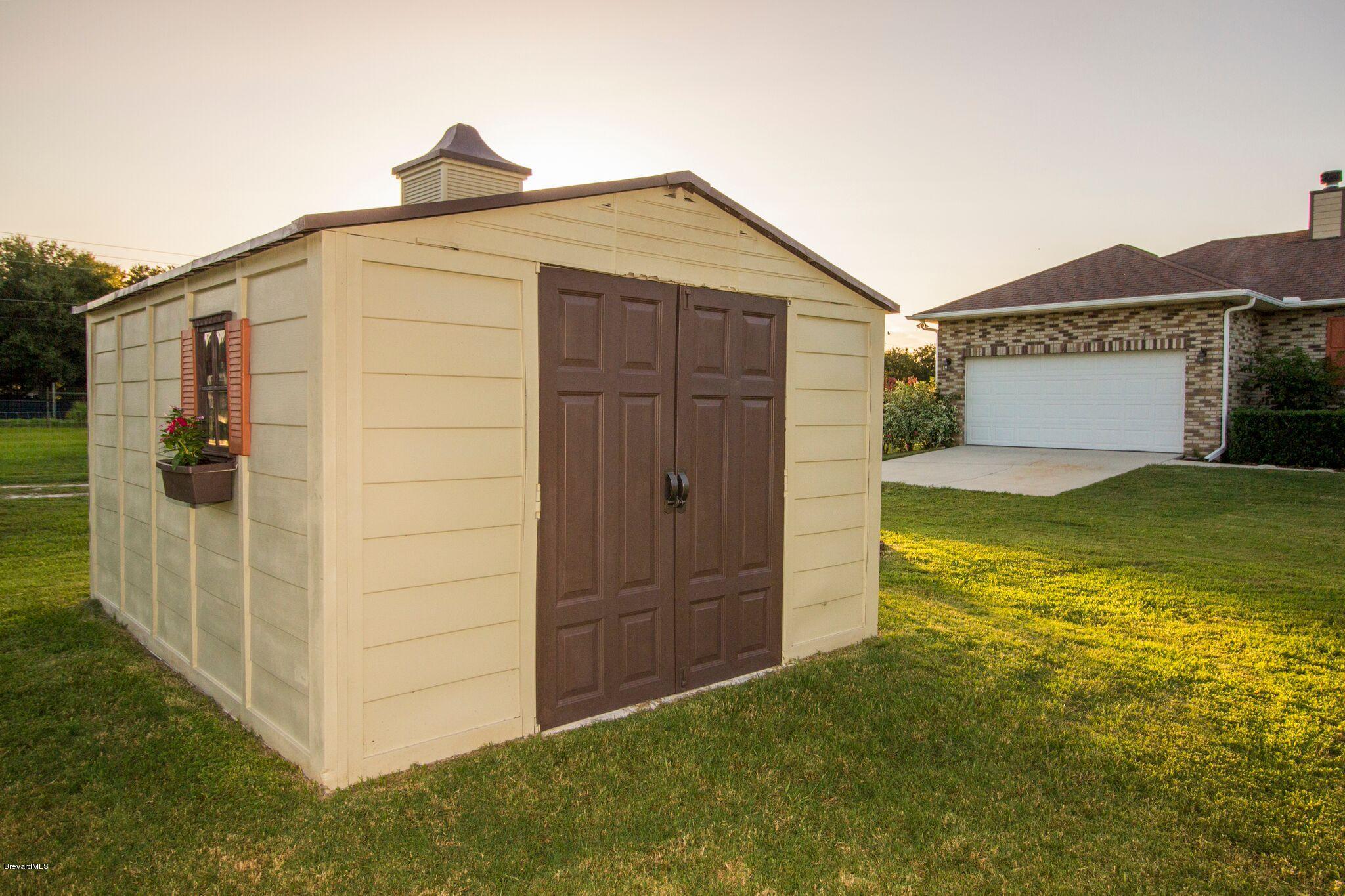 3300 Grandperrin Road Mims, FL 32754 - Photo 19 of 23 3300 shed